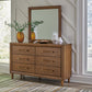 Lyncott Queen Upholstered Bed with Mirrored Dresser
