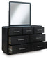 Rowanbeck King Upholstered Panel Bed with Mirrored Dresser