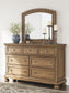 Vandenmore California King Storage Sleigh Bed with Mirrored Dresser and Nightstand