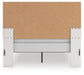 Zuraleus Queen Upholstered Panel Bed, Dresser, Mirror and Nightstand